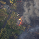 Image for article titled New aerial photos show Kilauea’s lava devouring neighborhoods
